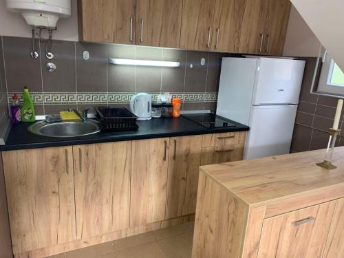 Kuchyň nebo kuchyňský kout v ubytování Cottage Nena Tara