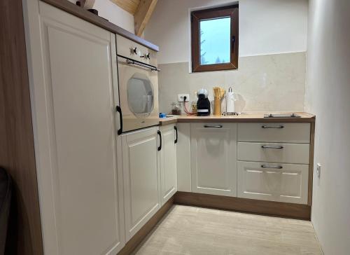 Кухня или мини-кухня в Wonderwood - cabin 1
