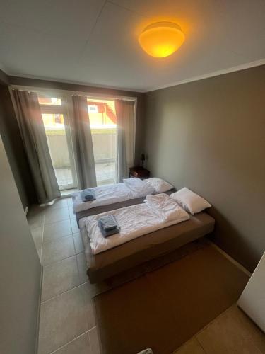 Ein Bett oder Betten in einem Zimmer der Unterkunft Fin leilighet i rolig område i Trondheim