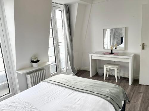 En eller flere senger på et rom på Lovely 2 bedroom in Central London - Marble Arch