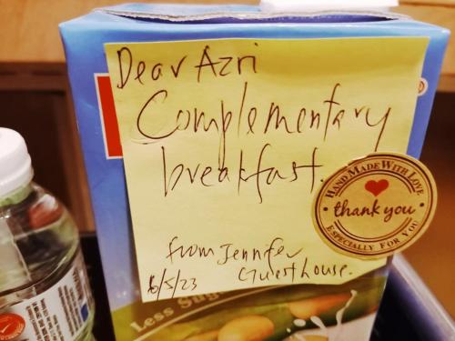 a sign is posted on a container of food at Bdr Bukit Tinggi Klang Tropicana Garden Homestay in Klang