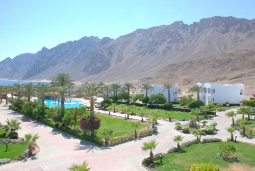 an aerial view of a resort with mountains in the background at Happy Life Village Dahab in Dahab