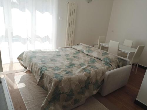Postelja oz. postelje v sobi nastanitve Profumo di pesto appartamenti Genova