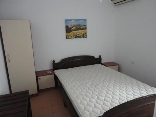 Ένα ή περισσότερα κρεβάτια σε δωμάτιο στο Guest Rooms Casa Luba