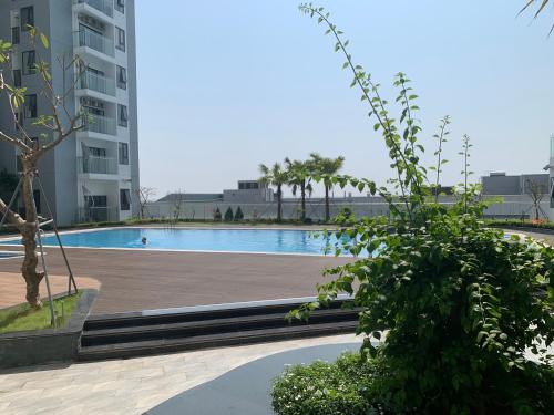 a swimming pool in the middle of a building at Nera House in Hue