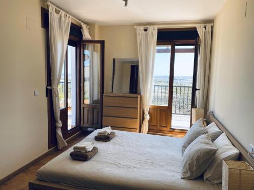 Ένα ή περισσότερα κρεβάτια σε δωμάτιο στο Beach & Golf Summer's con vistas increíbles!
