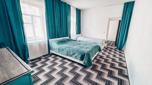 Ένα ή περισσότερα κρεβάτια σε δωμάτιο στο Surf Dacha Guest House