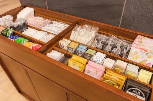 a drawer filled with lots of different types of food at Sotetsu Fresa Inn Sapporo-Susukino in Sapporo