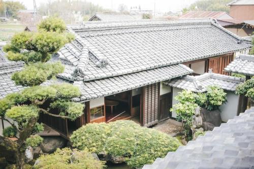 an overhead view of a house with trees at NIPPONIA 田原本 マルト醤油 in Nara