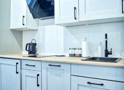 Η κουζίνα ή μικρή κουζίνα στο Apartament Dla Dwojga
