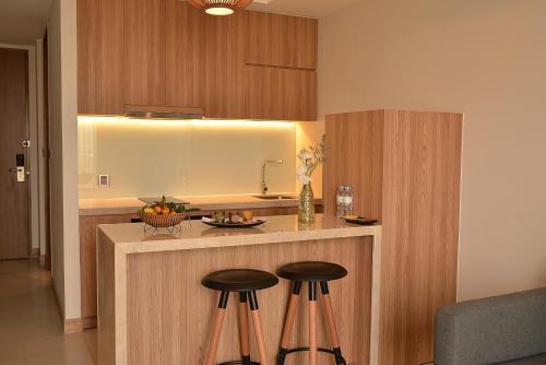 Dapur atau dapur kecil di Moon Hotel and Apartment Da Nang