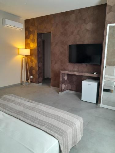 Katil atau katil-katil dalam bilik di BAARIA House Hotel