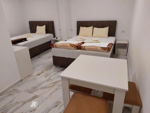 Ένα ή περισσότερα κρεβάτια σε δωμάτιο στο Vila Marija - Teo