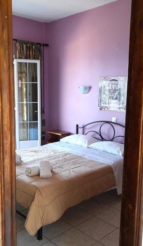 Postel nebo postele na pokoji v ubytování Stefanosplace ApartHotel Sea View