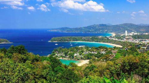 an aerial view of the island of grenada at Benetti house in Patong Beach