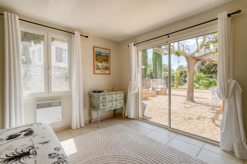 Posteľ alebo postele v izbe v ubytovaní Villa des Roses à Lorgues