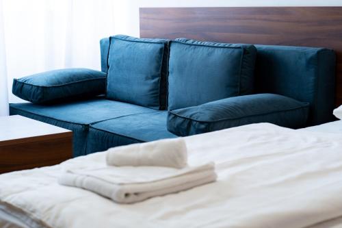 Ένα ή περισσότερα κρεβάτια σε δωμάτιο στο Artearia Hotel