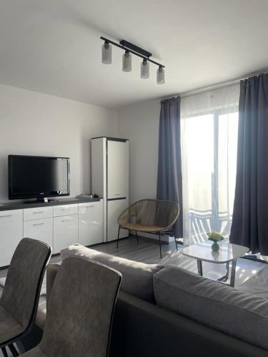 Televisyen dan/atau pusat hiburan di Apartament Daria Baile Felix