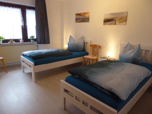 Кровать или кровати в номере City-Apartment Lüdenscheid