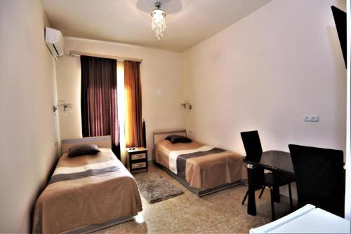 Postel nebo postele na pokoji v ubytování Comfort House Hotel