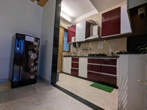 Kuchyň nebo kuchyňský kout v ubytování Back Stayz Hostel