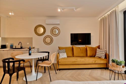 Гостиная зона в BlueApart Apartamenty Portowa