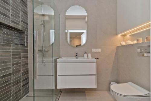 Ванная комната в BlueApart Apartamenty Portowa