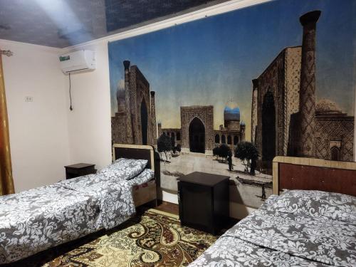 Katil atau katil-katil dalam bilik di Hotel Tashkent Muhammad