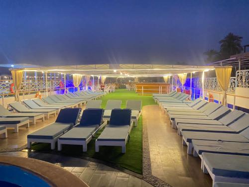 a group of chairs in a stadium at night at Luxor Aswan Victoria Nile Cruise every Saturday from Luxor 4 nights & every Wednesday from Aswan 3 nights in Luxor