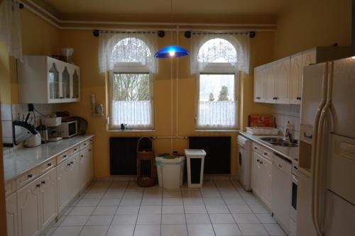 Una cocina o cocineta en Kisecset-vendégház