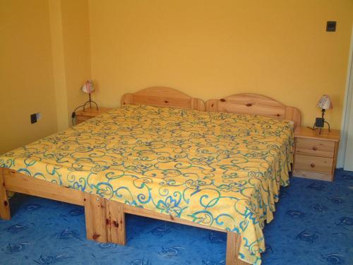 Ένα ή περισσότερα κρεβάτια σε δωμάτιο στο Kisecset-vendégház