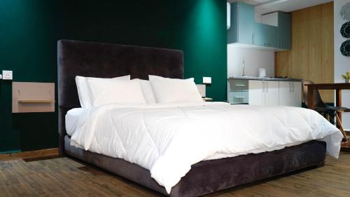 Ein Bett oder Betten in einem Zimmer der Unterkunft Appart AYAMOUS MARINA