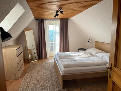Voodi või voodid majutusasutuse Das Winzerhaus am Grassnitzberg toas