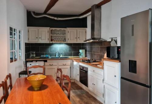 Kuchyňa alebo kuchynka v ubytovaní Appartement 70 m2 avec terrasse, proche de la mer