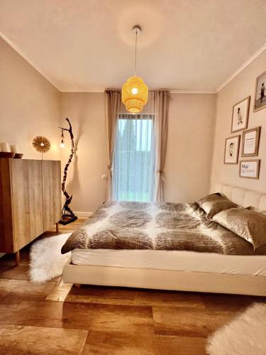 Postel nebo postele na pokoji v ubytování Silesia Apartments Ustron H125