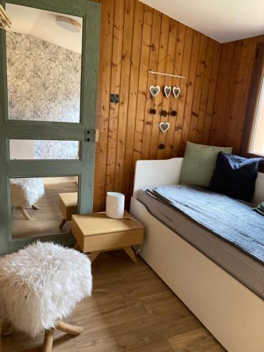 Postel nebo postele na pokoji v ubytování Le chalet du cœur