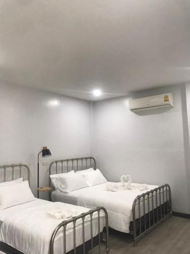 Postel nebo postele na pokoji v ubytování ONE DD HOMES