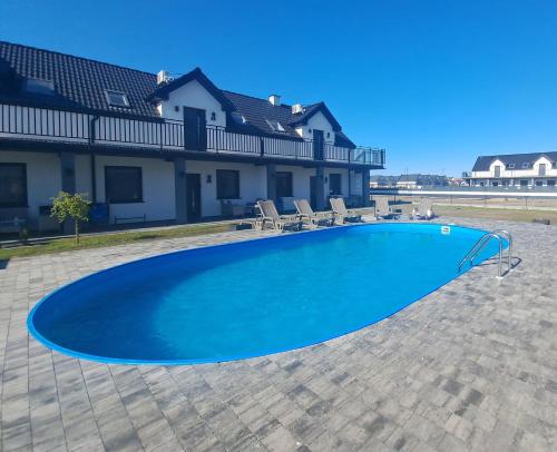 Bazén v ubytování Apartamenty Bursztynowa Zatoka - Łeba - Nowęcin nebo v jeho okolí