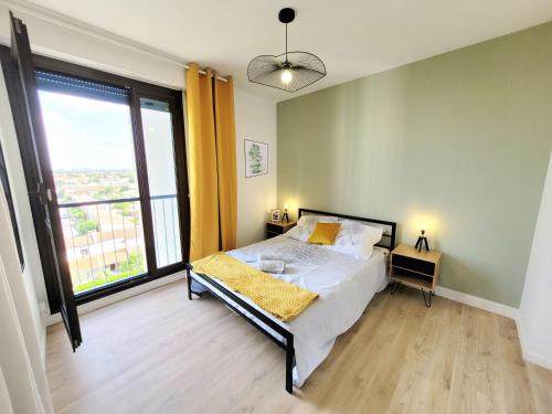 Postel nebo postele na pokoji v ubytování Chambre privative dans un appartement intégralement équipé