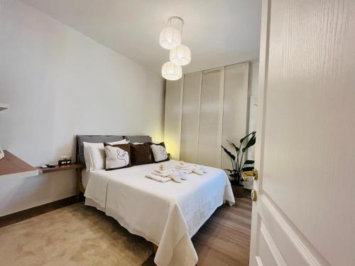 Кровать или кровати в номере Private room Thalia Apartments Mestre