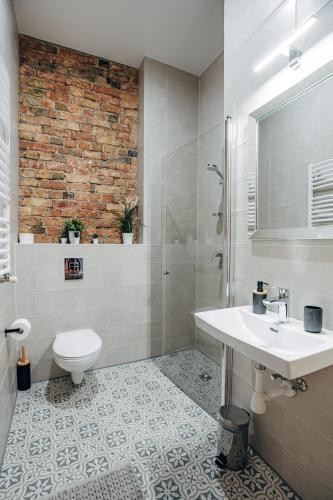 O baie la Constantine Apartments