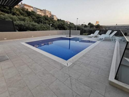 Bazén v ubytování Primošten Pool Fantasy apartmant nebo v jeho okolí