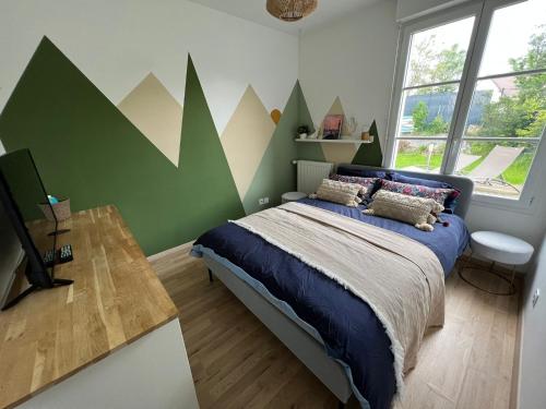 Posteľ alebo postele v izbe v ubytovaní Logement exceptionnel avec jardin proche Disney