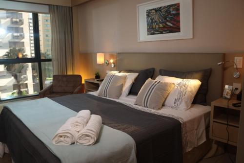 Gulta vai gultas numurā naktsmītnē Flat Premium Particular Cullinan Hotel