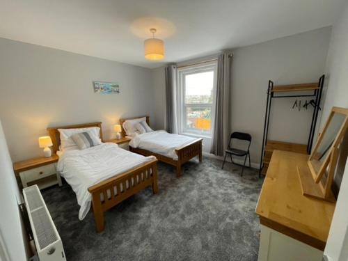 Postel nebo postele na pokoji v ubytování Dog Friendly Town House
