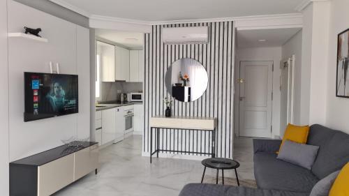 lovely sunny apartment with shared pool and private parking