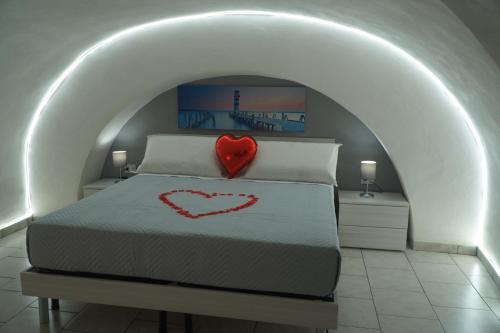 מיטה או מיטות בחדר ב-casa vacanze Sicilia bella