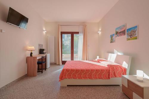 Postel nebo postele na pokoji v ubytování Le tre zie B&B