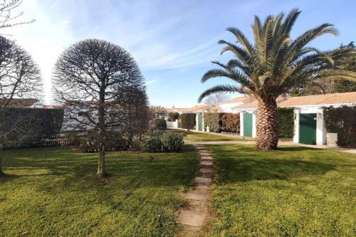 Κήπος έξω από το Maison dans résidence calme avec piscine chauffée