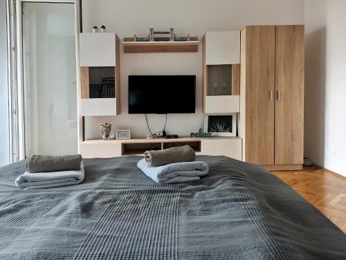 Кровать или кровати в номере Center Apartment Iva